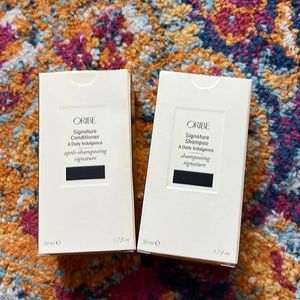 Brand new never used Oribe sample/travel set shampoo and conditioner